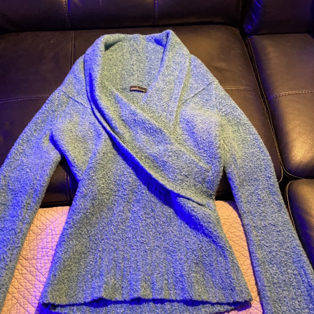 Super cute sweater color is greenish blue dark turquoise color. - Picture 6 of 6